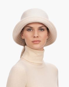 A cozy, lightweight women's bucket hat of spun wool with trapunto stitched brim rolls up easily into a coat pocket or a tote bag. Eric says, "It's definitely a bucket hat season where the attitude is a bit more casual than a fedora." What makes this women's bucket hat most desirable is that the crown is spun and then blocked to achieve the shape; The crown has no visible seams so it doesn't feel thick, while providing great insulation and protection from the elements. Brim span: 2.75"(7cm) Fully Winter Travel Hats In Solid Color, Beige Brimmed Felt Hat For Winter, Casual Brimmed Felt Hat For Winter, Cream Curved Brim Felt Hat For Winter, Beige Wool Felt Hat For Fall, Beige Felt Hat With Short Brim For Winter, Chic Wool Cloche Hat For Winter, Beige Short Brim Felt Hat For Winter, Cream Felt Hat With Curved Brim For Winter