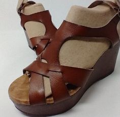 Brown Open Toe Wedge Sandals For Spring, Brown Open Toe Wedge Sandals, Brown Platform Wedge Sandals With Round Toe, Brown Open Toe Platform Sandals, Brown Platform Open Toe Sandals, Brown Open Toe Wedge Sandals For Vacation, Brown Wedge Heel Sandals For Beach, Brown Closed Toe Wedge Sandals For Beach, Brown Closed Toe Wedge Sandals For Vacation