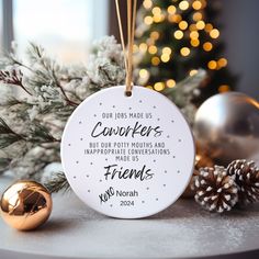 a christmas ornament with a quote on it