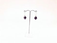 Amethyst Earrings // Oval Bali Setting // Silver Amethyst Earrings // Sterling Silver // February Birthstone Length: 1.3 inches Weight: 5 grams Stone: Amethyst Back side of the earring is ornately finished Hallmark 925 Note: please pay attention to the size and weight before purchasing. This is a very delicate and light weight earring. Handmade Oval Purple Earrings, Oval Amethyst Earrings For Gift, Oval Sterling Silver Crystal Earrings, February Birthstone, Amethyst Earrings, February Birth Stone, Light Weight Earrings, Earrings Sterling Silver, Sterling Earrings