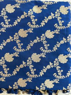 **SILK MARK CERTIFIED** **Gorgeous pure Banarasi Katan Silk Saree with blouse piece (unstitched) in blue and gold** **100% silk and high quality** **Direct from Banaras** Material: 100% Katan Silk Blouse piece: Included (Unstitched) Fall and Pico: YES Color: Blue, Gold Occasion: Festivals, Weddings, Cultural Events, Puja, Parties, Formal Gatherings, Family Functions, Graduations Experience the charm of this Handwoven Blue Banarasi Meenakari Katan Silk Saree, a beautiful blend of art and traditio Luxury Blue Katan Silk Dupatta, Art Silk Blouse With Meenakari For Women, Luxury Katan Silk Blouse For Puja, Luxury Royal Blue Banarasi Silk Dupatta, Saree Blue, Banarasi Katan Silk Saree, Katan Silk Saree, San Ramon, Silk Saree With Blouse