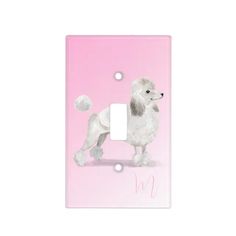 a light switch cover with a white poodle on it's front and pink background