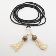 this necklace, was made with beautiful baroq pearls and black onyx, natural stone Total Length 64.5. inç. ( 163 cm. ) U.S. fast shipping by ups 2-3 days sending requests and suggestions, please feel free to convo me product in a box with a gift bag will be sent to For other inquiries, please visit the shop policies Thank you for visiting our shop http://www.etsy.com/shop/SevimsDesign İnstagram :sevimsdesign Elegant Black Beads Lariat Jewelry, Elegant Adjustable Pearl Necklace With Gemstone Beads, Elegant Black Beaded Lariat Jewelry, Elegant Adjustable Lariat Necklace With Gemstone Beads, Elegant Necklace With 108 Beads For Party, Elegant Black Jewelry With 108 Beads, Elegant Party Necklace With 108 Beads, Elegant Long Necklace With Round Natural Stones, Elegant Adjustable Long Necklace With Gemstone Beads