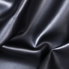 black leather textured up close to the camera