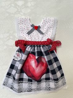 a painting of a dress with a heart on it