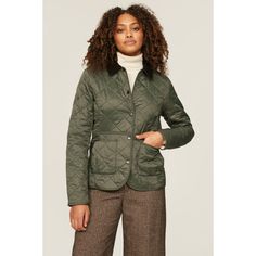 Green quilted nylon (100% Polyamide). Lining (100% Polyester). Jacket. Long sleeves. Collar. Front button closure. 25" from shoulder to hemline. Imported. Winter Nylon Quilted Jacket For Workwear, Classic Quilted Puffer Jacket For Fall, Classic Fall Puffer Jacket, Classic Long Sleeve Quilted Jacket With Padded Collar, Long Sleeve Puffer Quilted Jacket For Work, Long Sleeve Quilted Puffer Jacket For Work, Quilted Long Sleeve Puffer Jacket For Work, Classic Nylon Outerwear For Fall, Spring Nylon Outerwear With Button Closure