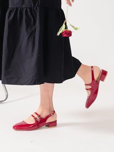 PRODUCT STORY Put your best foot forward with Miele Mary Jane Slingback. Classic in their simplicity, it is crafted in red, black and beige glossy pu leather with ultra-padded insoles. We uplift the look by replacing the usual with an multiple flower strap, embrace the delicate finish with a silk midi dress and a embellished clutch.  MATERIAL Upper Material: Imitation Leather Inner Material: Imitation Leather Sole Material: Synthetic TPU Inner sole material: Synthetic foam FITTING True to size ( Product Story, Embellished Clutch, Womens Mary Janes, Mary Jane Shoes Womens, Black And Beige, Silk Midi Dress, Mary Janes, Pu Leather, Black And Red