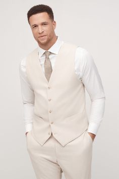 Embody laid-back elegance in the light tan suit. This mod, sandy shade with visible woven texture throughout is designed to suit you from sunny celebrations to the office, candlelit dinners, and everywhere in between. The men’s tan suit is crafted from signature Eco Stretch fabric, sure to keep you cool and comfortable through it all.