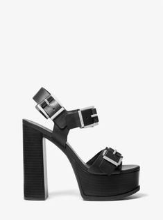 Made of supple leather, these extra-high Colby platform sandals are defined by utilitarian buckles that create an element of ‘70s-inspired tough-luxe appeal. Thick straps and a sturdy block heel make them comfortable to wear all night. Modern High Heel Sandals With Tang Buckle, Modern Block Heel Sandals With Tang Buckle, Modern Sandals With Stacked Heel And Rectangular Buckle, Modern Double Strap Heels With Buckle Closure, Modern Leather Heels With Tang Buckle, Modern Heels With Buckle Closure And Double Strap, Modern Heels With Double Strap And Buckle Closure, Modern Leather Heels With Double Strap, Modern Spring Heels With Tang Buckle