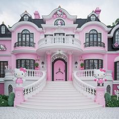 a large pink house with hello kitty decorations