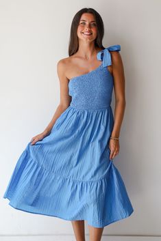 We can't imagine anything that would make you look more fabulous than the Dedicated To Glamour Blue One-Shoulder Midi Dress! This eye-catching dress is designed to turn heads and offer a refined, modern look for any special occasion. Featuring a bold blue hue that adds a vibrant pop of color, this midi dress showcases a sleek one-shoulder neckline, creating a unique and asymmetrical design that enhances your silhouette with a touch of glamour. Pair it with heels and statement jewelry for a polis Midi Dress Blue, One Shoulder Midi Dress, Asymmetrical Design, Blue Midi Dress, Blue Hues, Relaxed Style, Dress Blue, Statement Jewelry, Midi Length