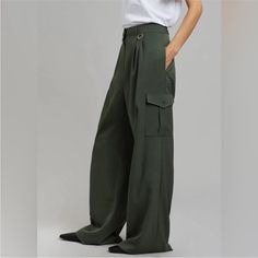 The Elm Wide Cargo Pants In Olive From Frankie Shop Blend Functionality With Style. Featuring A High-Rise Waist And Wide-Leg Silhouette, These Pants Offer A Contemporary Twist On Classic Cargo Pants With Their Utility Pockets And Relaxed Fit. Ideal For Both Day And Night, Pair Them With A Simple Tee For A Causal Look Or Dress Them Up With A Blouse And Heels. Never Worn As They Are So Long Wide Cargo Pants, Side Seam Pocket, Shop Pants, The Frankie Shop, Elastic Shorts, Frankie Shop, Long Maxi Skirts, Simple Tees, Flare Leg Pants