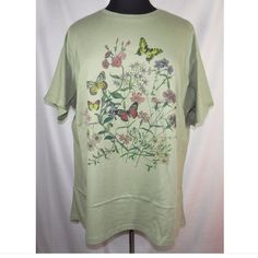 Evans Sage Green Butterfly And Floral Print T-Shirt With Hi-Low Hem. Plus Size 26/28. Bust Is 56" Relaxed And 62" Stretched. Hip Is 62" And Stretches To 72". Length Is 29 1/2" At The Front And 32 1/2" At The Back. New With Tags. Smoke Free, Pet Free Home. Casual Green Printed Tops, Casual Green Shirt For Spring, Green Floral Print Tops With Relaxed Fit, Green Printed Spring Tops, Green Floral Print Short Sleeve Top, Green Printed Cotton Tops, Green Graphic Print Top With Relaxed Fit, Green Graphic Print Relaxed Fit Top, Spring Crew Neck Shirt With Relaxed Fit