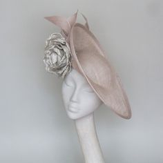 Silver grey sinamay  hat trimmed with two large hand made silk flowers. Simply chic the perfect finishing touch to your outfit.  Sits securely on a matching headband. A medium size hat 37 cms diameter. This item is made to order and can be made in different colour combinations A made to order item please allow 3 weeks processing time Fascinator Ideas, Blush Pink Fascinator, Light Pink Hat, Grey Fascinator, Navy Fascinator, Special Occasion Hats, Mother Of The Bride Hats, Headwear Fashion, Royal Ascot Hats