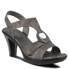 Classic and classy you can never go wrong with the Women's Patrizia Rola Dress Sandal. Synthetic leather upper in dress sandal style with an open toe. Slip on with elastic stretch strap. Metallic ring ornament. Synthetic lining with a synthetic padded footbed. Durable Polyurethane outsole with a 3 and 1/2 inch heel.. Elegant Synthetic Sandals With 4-inch Heel, Elegant Open Toe Synthetic Slingback Sandals, Elegant Open Toe Slingback Sandals, Elegant Synthetic Slingback Sandals Medium Width, Elegant Synthetic Medium Width Slingback Sandals, Elegant Medium Width Synthetic Slingback Sandals, Elegant Synthetic Heels For Spring, Elegant Fitted Synthetic Sandals, Elegant Medium Width Sandals For Spring