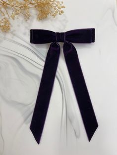 This velvet bow measures 5" wide and 7" in length attached to a silver coloured French Barratte. This is a very elegant looking bow that is suitable for both children and adults.  Customizable ribbon ends. Please specify if you would like a "V-cut" , "Diagonal cut" or "Straight cut" at the note of the order.  Each item is handmade. The item you receive might vary slightly from the product picture due to the nature of your item being 100% handmade to order. Shipping: - Shipping within Canada is s Deep Purple Hair, Purple Hair Bows, Velvet Hair Bow, Dark Purple Hair, Ribbon Ends, Velvet Hair, French Barrette, Velvet Bow, V Cuts