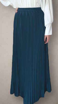 Modest high rise maxi skirt. Elastic waistband. Pleated. Fully lined for full coverage. Solid Color Maxi Skirt With Elastic Waistband, Chic Pleated Maxi Length Skirt, Chic Long Pleated Skirt With Elastic Waistband, Solid Color Fall Maxi Skirt, Chic Maxi Length Pleated Lined Skirt, Chic Maxi Length Lined Pleated Skirt, Flowy Fall Maxi Skirt With Pleated Waist, Chic Maxi Length Pleated Skirt With Lining, Fall Maxi Length Skirt