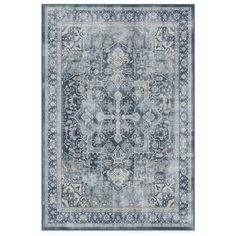 a blue and beige rug with an ornate design