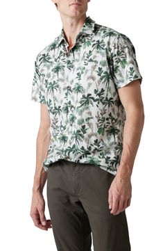 This breathable cotton sport shirt features a tropical print that takes you from desk to barbecue with ease. 29" length; 43" chest (size Medium) Point collar Short sleeves 100% cotton Machine wash, line dry Imported Casual Cotton Top With Palm Tree Print, Casual Cotton Tops With Palm Tree Print, Casual Short Sleeve Shirt With Plant Print, Summer Leaf Print Relaxed Fit Tops, Relaxed Fit Leaf Print Summer Top, Relaxed Fit Leaf Print Top For Summer, Casual Button-up Shirt With Tropical Print, Casual Green Cotton Hawaiian Shirt, Relaxed Cotton Top With Palm Tree Print