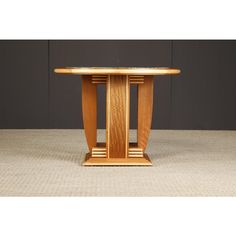 a wooden table sitting on top of a carpeted floor