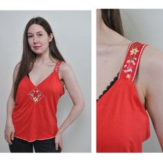 Check out this floral red tank top made of mixed synthetic fabric with flowers embroidery. Good choice for summer festival outfit. Great relaxed top for hippie vibe. Welcome to TARASCOMMON.ETSY.COM Unique clothing from the 20th century. Model tall - 170cm. Size: M. Width - 46cm / 18.11inch; Length - 60cm / 23.62inch. All measurements are taken seam to seam while lying flat. Viscose/ Elastan. This item is vintage, so it can have some defects. Additional photos can be send We are glad that you are Orange V-neck Top For Festivals, Spring Vintage V-neck Tank Top, Vintage V-neck Tank Top For Spring, Red Sleeveless Top With Floral Embroidery, Red Sleeveless Tops With Floral Embroidery, Sleeveless Red Tops With Floral Embroidery, Bohemian Cami Tank Top For Festival, Orange Bohemian Top With Floral Embroidery, Hippie Style Summer Festival Tank Top