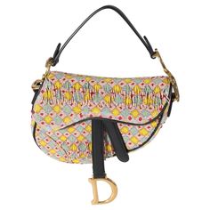 Listing Title: Christian Dior Multicolor Beaded Tassel Micro Saddle Bag SKU: 134533 Condition: Pre-owned Handbag Condition: Very Good Condition Comments: Item is in very good condition with minor signs of wear. Missing beads along exterior.Interior scuffing and light marks. Light scratching to hardware. Brand: Dior Model: Micro Saddle Bag Origin Country: Italy Handbag Silhouette: Top Handle Occasions: Evening;Everyday;Fall/Winter;Weekend Size (Generic): Mini Size (Specific): Mini Year Manufactured: 2018 Interior Material: Suede Interior Color (Generic): Black Handbag Closure Type: Magnetic Handbag Accessories: Box;Dustbag;Gift Ribbon;Care Booklet Hardware Color: Gold-Tone Exterior Color (Generic): Multicolor Exterior Material (Generic): Embellished Exterior Material (Specific): Beaded Leng Dior Shoulder Bag, Gift Ribbon, Handbag Wallet, Wallet Accessories, Saddle Bag, Luxury Brands, Luxury Shop, Designer Jewelry, Black Handbags