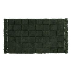 a green rug with fringes on it