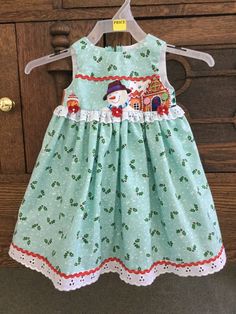 Snowman Themed Christmas Dress, Cotton Blend with Eyelet Lace, Rick Rack and Red Bows. Long Lengh Snowman Themed Christmas, Baby Girls Dresses, Christmas Blue, Themed Christmas, Rick Rack, Greenville Sc, Dress Cotton, Star Dress, Eyelet Lace