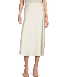 From Antonio Melani&#x2C; this skirt features: Draped satin fabrication A-line silhouette Midi lengthUnlinedSide zip and hook closureApprox. 33" in lengthPolyesterDry cleanImported. Winter Shower, Satin Midi Skirt, Career Woman, Antonio Melani, Satin Skirt, Dillard's, Classy Outfits, Modern Woman, Midi Skirt