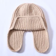 For fashion enthusiasts out there, this beanie is a must-have. Its comfort factor, complete with earflaps, makes it a preferred choice among people. Women particularly love this comfortable beanie for its warmth and coziness. Crafted from high-quality cashmere and wool, it offers both comfort and style. Don't miss out on this trendy beanie!SpecificationsStyle: CasualPlace Of Origin: China (Mainland)Pattern Type: SolidOrigin: Mainland ChinaModel Number: JX-016Material: WoolItem Type: Skullies & BeaniesGender: WOMENFeature: Keep warmDepartment Name: AdultCN: ZhejiangBrand Name: GeraldBlackApplicable Season: WinterApplicable Scene: Casual ShippingThis product ships from China in 3 to 5 days. You should receive this product within 12 to 21 business days. Our standard shipping is free to most c Warm Winter Hat, Cashmere Beanie, Warm Winter Hats, People Women, Skull Design, Winter Hat, Winter Looks, Beanie Hat, Stylish Accessories