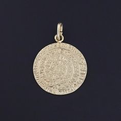 The Phaistos Disc is one of the most iconic yet enigmatic artifacts of the Minoan civilization.  The original clay disc dates to 1700-1600 BC and was discovered by Italian archaeologist Luigi Pernier on the Greek island of Crete on July 3, 1908.  This tiny replica of the Phaistos Disc is rendered in 14k gold and dates to the 1960s.  The piece measures 1.1 inches from the top of the bail to bottom by 0.8 inches wide, and it is in great condition. We have many other fantastic offerings of period f Phaistos Disc, Minoan Civilization, Jewelry Post, July 3, Disc Pendant, Greek Island, Antique Shops, Crete, Artifacts