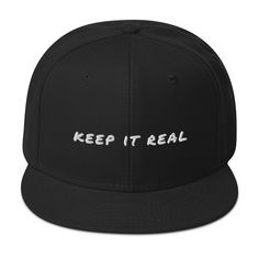 Introducing our sleek Keep It Real Snapback Hat - the perfect accessory for a trendy and laid-back style. This classic baseball cap comes with an adjustable snap closure, ensuring a comfortable fit for all head sizes. Its flat brim adds an urban edge, while the high-quality materials keep you cool and stylish in any setting. Key Characteristics: • 85% acrylic, 15% wool • Structured, 6-panel, high-profile • Plastic snap closure • Grey under visor • Head circumference: 22”–24” Trendy Fitted Hat With Flat Brim, Trendy Flat Brim Baseball Cap For Baseball Season, Trendy Flat Brim Baseball Cap, Classic Flat Cap Fitted Hat For Streetwear, Trendy Flat Bill Baseball Cap, Trendy Flat Bill Baseball Cap For Sports, Trendy Everyday Snapback Hat With Flat Bill, Trendy Flat Bill Hat For Everyday, Trendy Flat Brim Baseball Cap For Everyday