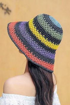 Packable crochet straw bucket hat with multi color stripes. Also comes with a size adjuster inside. Made of 100% straw. Can be folded very small to fit in your purse. Made In: China