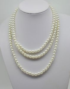 This is a vintage pearl necklace designer signed Sarah Coventry. It is a single strand of faux pearls with has a drop of 29", which can be worn many different ways. It dates from the 1960's/70's and is in excellent condition. White Pearl Long Necklace For Formal Occasions, Formal White Pearl Long Necklace, Classic Long Necklace For Formal Occasions, Vintage White Long Pearl Necklace, Vintage Pearl Necklace, Pearl Necklace Vintage, Vintage Pearl, Sarah Coventry, Vintage Pearls