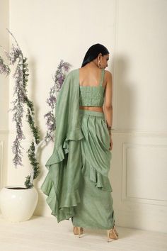 Sage Green Ruffle Saree with Stitched Blouse Set of 2 - Trendroots Sage Green Saree, Pista Green Dola Silk Pre-draped Saree With Unstitched Blouse, Green Ruffled Pre-draped Saree For Wedding, Green Georgette Saree With Ruffles, Green Ruffle Saree, Ruffle Saree, Drape Saree, Green Saree, Embroidered Blouse