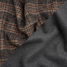 Double the fun and warmth of your next project with this Gray, Beige and Russet Glen Plaid Brushed Wool Blend Double Cloth Coating. The two-layered structure presents a beige, black, and dark red plaid face and a gray reverse, combining to create a heavyweight fabric with a malleable drape. A brushed finishing technique leaves the hand captivatingly soft and fuzzy. Though not necessary, a lining will increase structure and warmth. 

A plaid wool blend is the perfect way to elevate your winter wardrobe—from the iconic silhouette of a long wool coat to the unique style of an oversized poncho, this fabric welcomes the cold with stylish practicality. Mood Designer Fabrics, Printed Linen Fabric, Wool Quilts, Tencel Fabric, Mood Fabrics, Long Wool Coat, Glen Plaid, Linen Suit, Stripe Silk