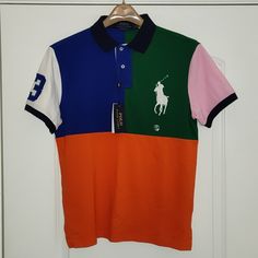 Custom Slim Fit Fitted Color Block Polo Shirt, Fitted Blue Color Block T-shirt, Fitted Multicolor Polo Collar Top, Fitted Multicolor Polo Shirt, Fitted Multicolor Shirt With Color Block, Fitted Multicolor Color Block Shirt, Orange Polo Shirt With Polo Collar For Summer, Orange Polo Shirt With Collar For Summer, Summer Orange Polo Shirt With Polo Collar