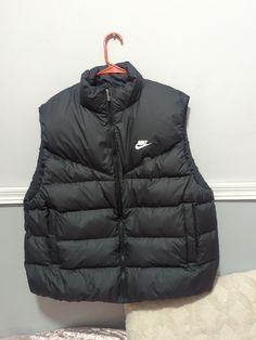 Nike Sportswear Therma-FIT Women's Down Vest, Size XL, Black, $150 NWT. Functional Black Vest For Fall, Winter Athleisure Vest For Outdoor Activities, Functional Black Winter Vest, Black Vest For Winter Outdoor Activities, Black Winter Vest For Outdoor Activities, Winter Black Vest For Outdoor Activities, Nike Black Outerwear For Winter Sports, Sporty Vest For Cold Weather, Black Sports Vest For Winter