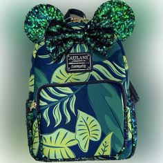 Disney Aulani Resort Paradise Vibes Loungefly Backpack Condition: Brand New With Tags Exclusive To Aulani, A Disney Resort & Spa Located In Beautiful Hawaii Purchased While Vacationing In Hawaii Details: - Colors: Green, Blue, Lime Green, Navy - Sequins On Ears, Bow, Side Pockets, Sides Of Front Pocket, And Bottom Of Bag - Gold Colored Flower Zipper Pulls - 4 Hidden Mickeys - Top Carry Handle - Adjustable Straps / Faux Leather From Smoke-Free Home *Not Part Of Discounted Bundle* Disney Aulani Resort, Hidden Mickeys, Aulani Resort, Loungefly Backpack, Beautiful Hawaii, Aulani Disney Resort, Minnie Mouse Bow, Disney Aulani, Loungefly Bag