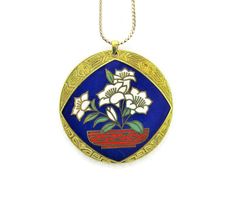 "Vintage genuine Peking Jewelry Company Cloisonné 1 7/8\" wide pendant is in excellent condition. ✿ View Other vintage Cloisonne Jewelry here ✿: https://www.etsy.com/shop/BajanLizard/search?search_query=Cloisonne ✿ View Other vintage Peking Jewelry here✿ https://www.etsy.com/shop/BajanLizard/search?search_query=Peking+Jewelry ✿ Return to Our Main Shop ✿: http://BajanLizard.etsy.com" Traditional White Flower Jewelry, Traditional Flower Necklaces For Gifts, Traditional White Necklace With Large Pendant, White Ceremonial Pendant Necklaces, White Pendant Necklace For Ceremonial Occasions, Traditional Flower Necklace As Gift, Traditional White Collectible Jewelry, Traditional White Flower Pendant Jewelry, White Enamel Necklace With Large Pendant