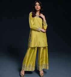 Indulge in the vibrant elegance of this citron raw silk shirt and pants set. The full-sleeved shirt and pants are complemented by a net dupatta with a delicate light sequin spray. Ideal for special events.This exquisite ensemble is designed in a refreshing citron hue, perfect for making a fashion statement. The raw silk shirt in this ensemble features a classic and timeless style. The full sleeves and round neckline add to its elegance and versatility.�The matching raw silk pants perfectly compl Raw Silk Pants, Short Formal Dresses, Shirt And Pants Set, Colour Pallets, Charity Events, Formal Dresses Short, Net Dupatta, Silk Pants, Full Sleeves