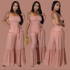 Women's Pink Strapless Jumpsuit Women's Soft Pink Jumpsuit Semi-Stretch Jumpsuit Smocked Top Strapless Wide Legs No Closure 65% Rayon 35% Polyester Hand Wash Cold Model Is Wearing A Small Model Stats Height: 5.6" Bust:34" / Waist:25" / Hips:41" Summer Strapless Jumpsuit With Elastic Waistband For Loungewear, Strapless Jumpsuits And Rompers For Summer Loungewear, Casual Pink Strapless Jumpsuit, Strapless Jumpsuits And Rompers With Elastic Waistband For Vacation, Strapless Sleeveless Jumpsuit With Smocked Bodice For Beach, Strapless Jumpsuit With Smocked Bodice For Beach, Summer Strapless Jumpsuits And Rompers With Elastic Waistband, Casual Pink Strapless Jumpsuit For The Beach, Strapless Beach Jumpsuits With Smocked Bodice