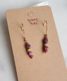 Solazur earrings "Ruby" --- Unique. Beautiful. Good energy. An artistic, bold and dainty design - to add a vibrant pop of color and style to your outfit. Earrings are  made with small genuine Ruby cube beads, gold plated metal and tiny Japanse seed beads.  ◇hypoallergenic hooks (gold plated) Earlobe drop lenght: less than 1 inch Solazur jewelry are made to be eye catching, for you to connect with and most of all, to be comfortable to wear. Stone story: Ruby is an excellent energy and vigor stone. Encourages passion for life, to follow your bliss. Brings a positivity and enthusiasm.  Since ancient times, rubies have symbolized passion, protection, and wealth. Many cultures have strong belief as ruby beings a symbol of love and commitment. Every item is made to order. I make sure all beads a Ruby Cube, Ruby Earrings Gold, Red Bead Earrings, Gemstone Drop Earrings, Cube Beads, Birthday Gift For Women, Red Gemstones, Ruby Earrings, Earrings Dainty