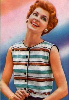 a woman with red hair wearing a striped top