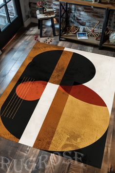 a rug with an abstract design on the floor