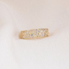 Hand-carved band available in 14k Yellow, White, or Rose Gold, set with a total of 52 (0.67 ct.) White Diamonds. A disco-party on the go! This luminous, luxe, luxurious discothèque Divinité band embodies shimmering, effervescent, exuberant Love. Love is Sacred and Divine - it is the miraculous gift of the Holy Spirit, making up the world we live in. A reminder to keep love at the forefront of all you do, a token of celebration and joy, a talisman of your angels guiding you through unconditional Gold Diamond Ring With Sparkling Stones For Party, Party Gold Diamond Ring With Sparkling Stones, Glamorous Brilliant Cut Diamond Ring For Party, Glamorous Brilliant Cut Diamond Party Ring, Dazzling Diamond Ring With Pave Setting For Party, Party Cubic Zirconia Diamond Ring In Yellow Gold, Glamorous Gold Diamond Ring For Party, Party Yellow Gold Cubic Zirconia Diamond Ring, Dazzling Yellow Gold Rings For Party