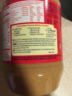 a jar of peanut butter sits on a counter with the label labeled, irresistible peanut butter cookies