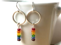 "Love these gorgeous colorful rainbow bead earrings! One of a kind earrings! They will go with so many outfits and make a beautiful statement! These earrings dangle about 2\" long and lightweight. I can make more of these earrings if you need more pairs. Just message me! A great gift for that special someone who has everything! Check out my other mixed metal earrings! https://www.etsy.com/shop/HeidiKindFinds?ref=hdr_shop_menu&search_query=mixed+metal+earrings" Rainbow Nickel-free Dangle Hoop Earrings, Nickel-free Rainbow Dangle Hoop Earrings, Rainbow Dangle Earrings For Everyday, Rainbow Dangle Hoop Earrings With Ear Wire, Rainbow Round Earrings With Colorful Beads, Everyday Multicolor Dangling Beads Earrings, Nickel Free Rainbow Beaded Earrings For Gifts, Rainbow Beaded Dangle Hoop Earrings, Nickel-free Rainbow Round Beaded Earrings