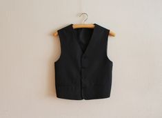 "Men's Vest Black Vest Black Striped Gentlemen's Vest Mens Waistcoat Wedding Classic Vest Formal Fitted Edwardian Victorian Renaissance Steampunk Baroque Small size No size label, estimated size small Measurements (lying flat): Length(back): 21\"/ 53.5 cm Chest(pit to pit): 18 1/4\"/46.4 cm Please check measurements to insure a proper fit. Remember to allow yourself some extra room for movement. You can compare these with something from your closet that fits you well. Condition: great Vintage Co Semi-formal Black Vest With Buttons, Classic Black Suit With Vest, Classic Black Suits With Vest, Black Suits With Vest For Formal Occasions, Classic Fitted Black Nehru Jacket, Classic Black Nehru Jacket For Work, Fitted Black Nehru Jacket For Business, Fitted Black Nehru Jacket For Groom, Black Nehru Jacket For Formal Occasions