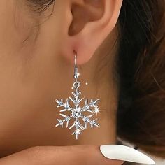 Snowflake Dangle Earrings are a winter wonder! Their titanium steel fishhook design, CZ center accent, and sparkling CZ accents throughout make these 1.18 x 1.79 inches with an approximate 2" drop snowflake earrings a must-have! Snowflake Clip On Earrings, Winter Formal Accessories, Beachy Anklets, Celebrity Style Jewelry, Xmas Outfit, Cartilage Jewelry, Formal Accessories, Snowflake Earrings, Winter Formal